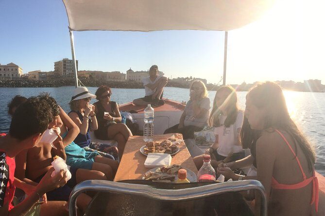 Boat tour of Ortigia Island and sea caves - The swim stop by the caves: a short burst, not a beach day