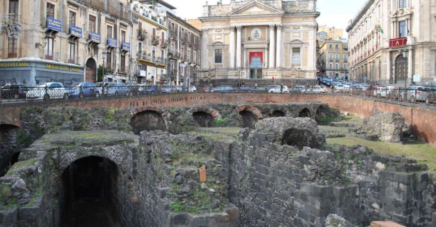 Catania: Underground and Street Food Walking Tour - Where the walk begins: Piazza Stesicoro and the Roman amphitheater entrance