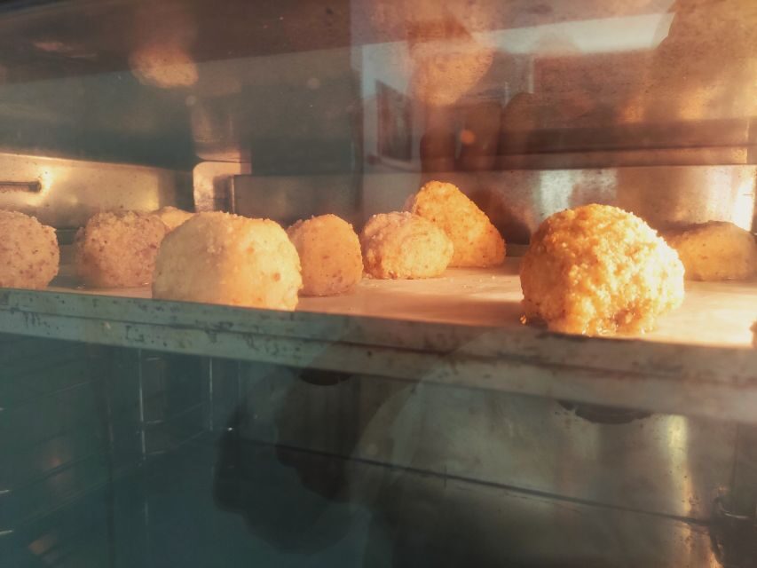 Cooking Class Arancini in Catania - Entering the kitchen lab at the meeting point