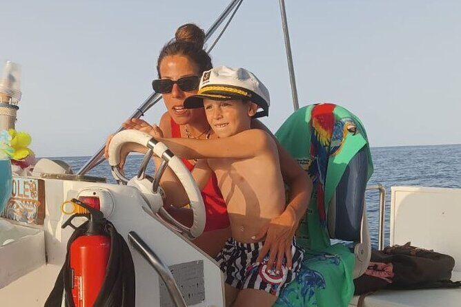 Discovering Cefalù's Coastline Activity on a Mini Catamaran - Getting On Board at Eolo cafè and How the Timing Feels