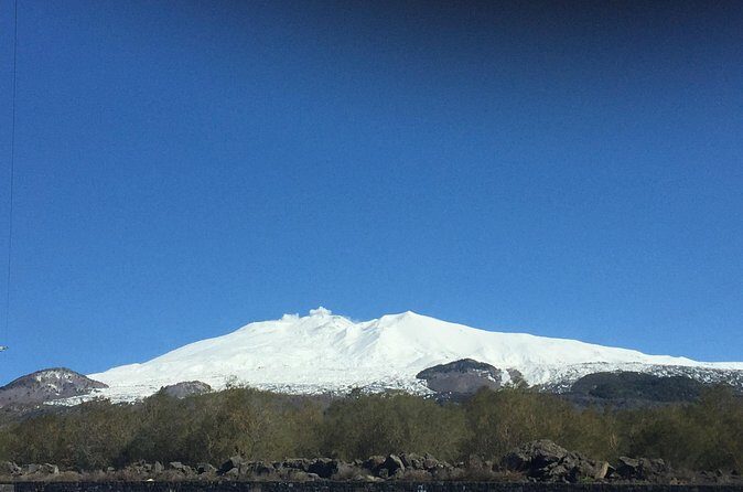Etna and Taormina tour - Lava cave time: helmets and torches turn geology into an experience