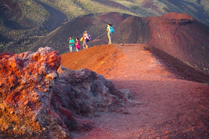 Etna at sunset - 4x4 tour with Sicilian sweet aperitif - Stop 1 on Etna: lava flows, crater-side views, and a cave with lights + helmets