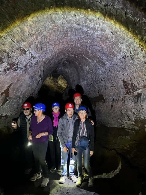 ETNA SUNSET: GUIDED TOUR OF ETNA WITH PICKUP FROM CATANIA - Grotta dei Tre Livelli Cave: Helmets, Torches, and the Center-of-Earth Feeling