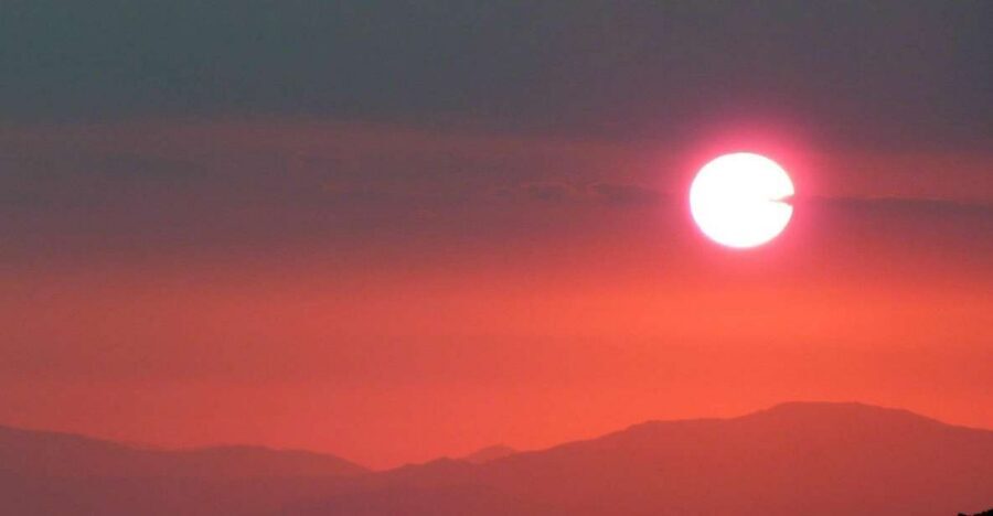 From Catania: Mount Etna Sunset Tour - The cave stop: helmets, flashlights, and a different kind of cold