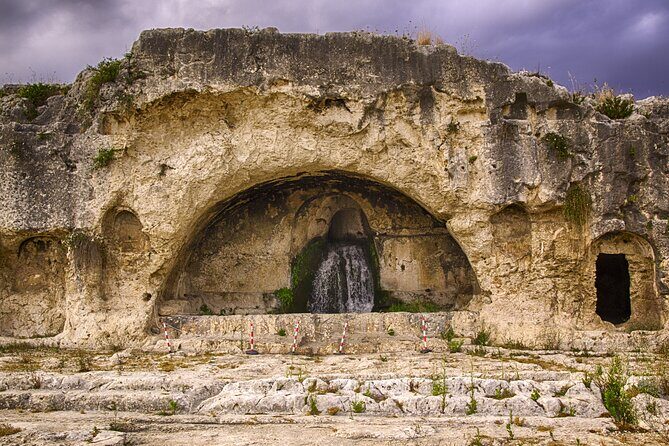 Group guided tour of the archaeological park of Neapolis - Ear of Dionysius: a cave visit with legend in the background
