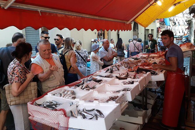 Markets and monuments: walking tour and street food in Palermo - Piazza Olivella to Fontana della Vergogna: statues, drama, and shade