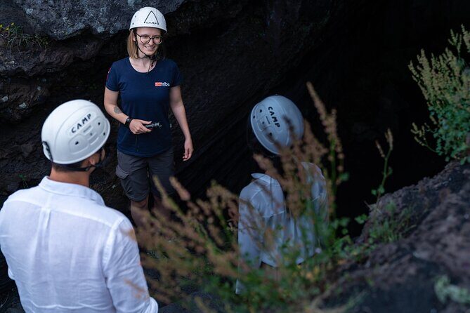 Mt Etna and Wine tasting tour from Catania - Grotta dei Tre Livelli lava cave: helmets, lamps, and that sudden cool air