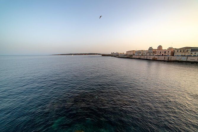 Ortigia by boat - The guide setup: live narration in Italian and English