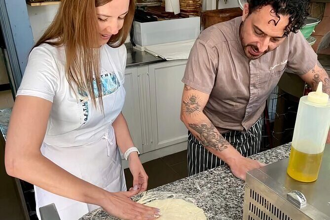 Pizza & Cannolo Making in Taormina by the Sea - Building the base: pizza dough, bread flour, and Sicilian bruschette