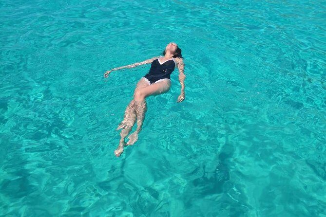 Private Tour Half Day Boat Trip in Favignana from Trapani - Scogliera Cala Azzurra: your first hour of clear-water snorkeling