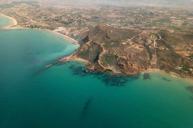 Scala dei Turchi in 3.5 hours, boat tour with stops for swimming - Stop 2: Faro di Capo Rossello, a headland swim with a lighthouse vibe