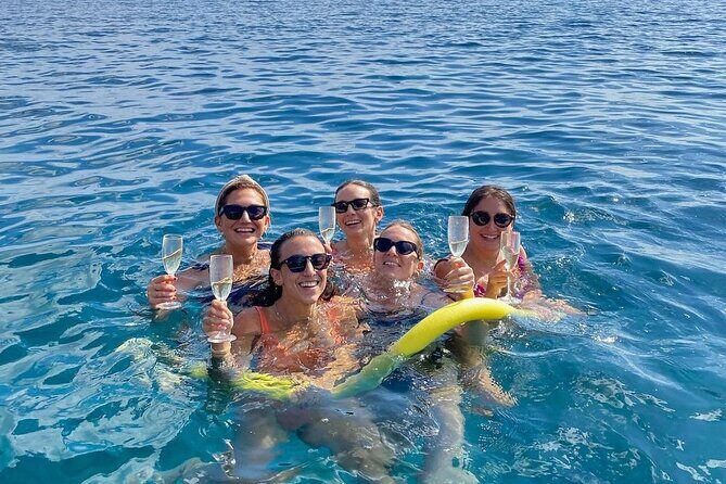Sicilian wine tasting on the boat in Taormina - Lido Mazzarò: Elegance on the Way to Snorkeling