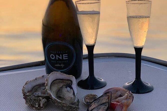 Syracuse Aperitif boat at Sunset island and sea caves - Grotta delle Stallatiti: The Biggest Cave Stop and the Best Color Play