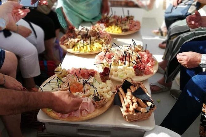 Syracuse Aperitif boat at Sunset island and sea caves - Capuchin Cove and the First Cave Stops: The Moment the Coast Makes Sense