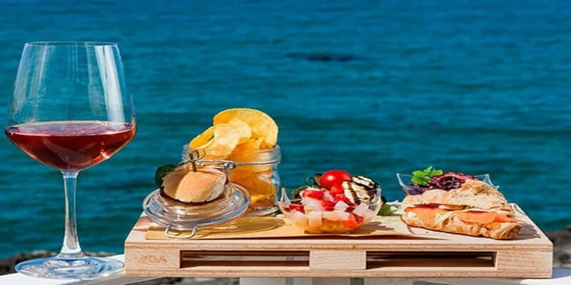 Taormina: Boat Tour with Aperitif on Isola Bella - Aperitif on Board: Local Fruit, Almond Paste, and the Relaxed Ending