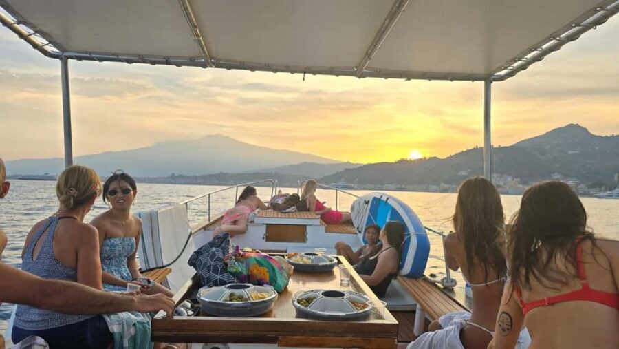 Taormina: Sunset Boat Tour with Aperitif - Snorkeling and bath stops: what’s included and what to expect in real life