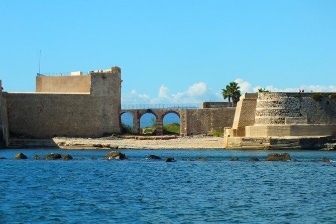 Tour of the island of Ortigia and exploration of sea caves with baths. - What to Bring: Swim Stuff, Sun Protection, and Comfort