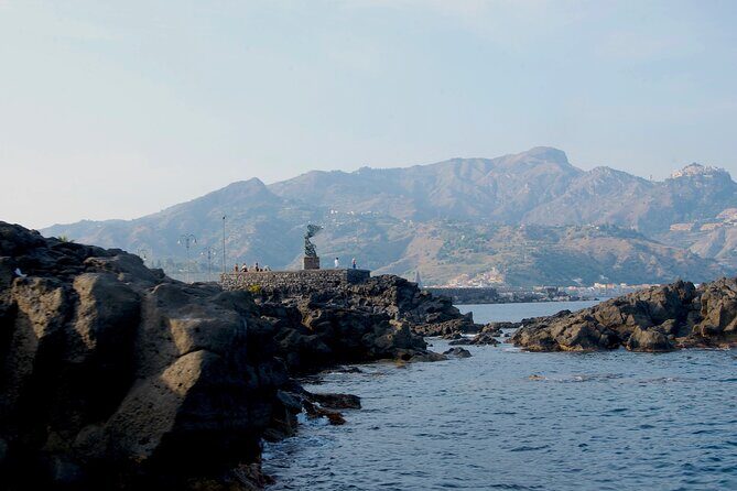Tour to Baia di Taormina, Isola Bella and Naxos - Stop 1 in Taormina: Isola Bella, Grotta Azzurra, and swim time