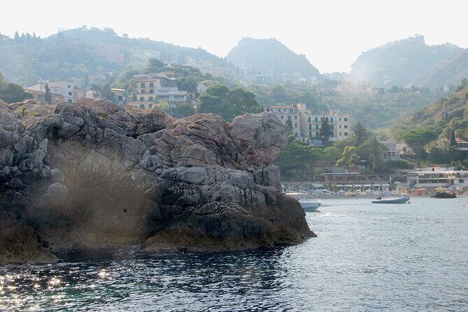 Tour to Baia di Taormina, Isola Bella and Naxos - On board: open bar, music-led energy, and small-group comfort