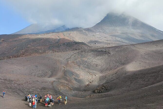 Tour to the Summit Craters of Etna 2920 meters with cable car and Jeep - Stop 1 at Rifugio Sapienza (2,000 m): the view shifts before the walking starts