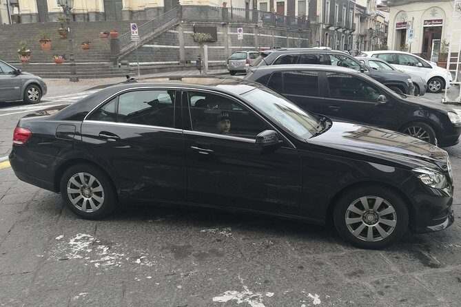 Transfer from Taormina and sourrounding villages to Catania Airport - Vehicle Choice: Sedan or Minivan for Your Group